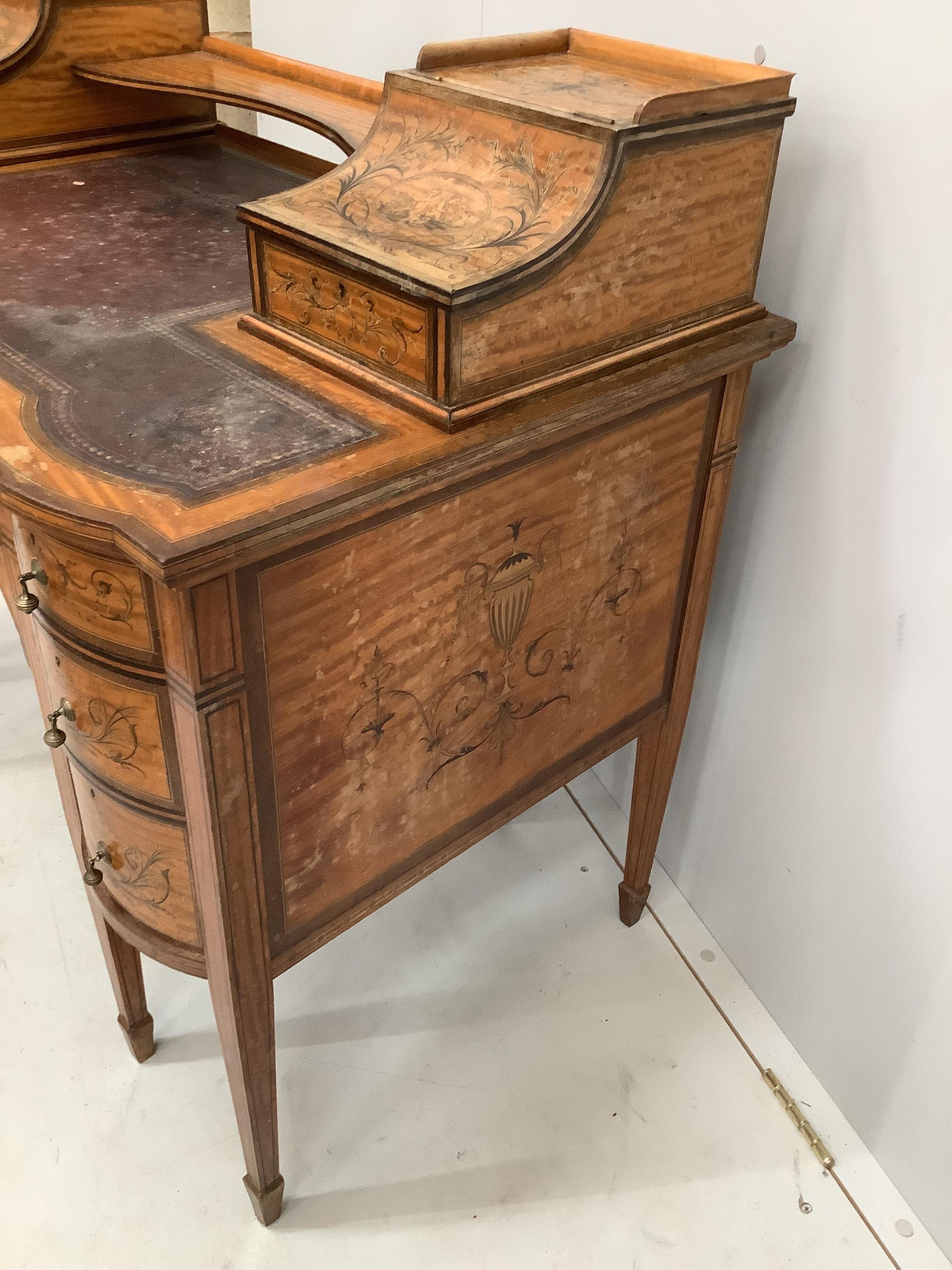 An Edwardian marquetry inlaid Sheraton Revival satinwood kneehole desk, width 106cm, depth 60cm, height 90cm